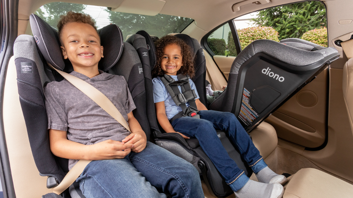 Three child seats clearance in back of car